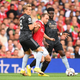 Man United’s Christian Eriksen is fouled by Arsenal’s Martin Odegaard during the Premier League match between Manchester United and Arsenal FC at Old Trafford.